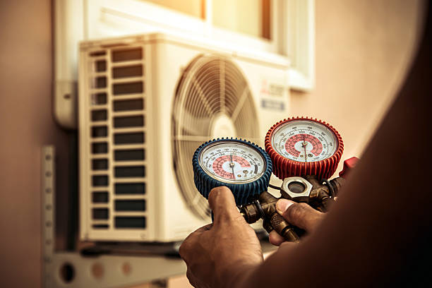 Professional Heat Pump Repair technician working in Darien, WI